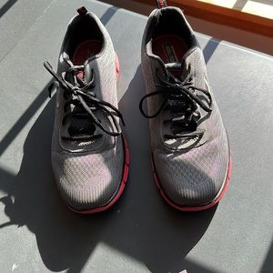 Skeckers. Gel top memory foam sneakers. Very little wear.  Nice comfortable shoe